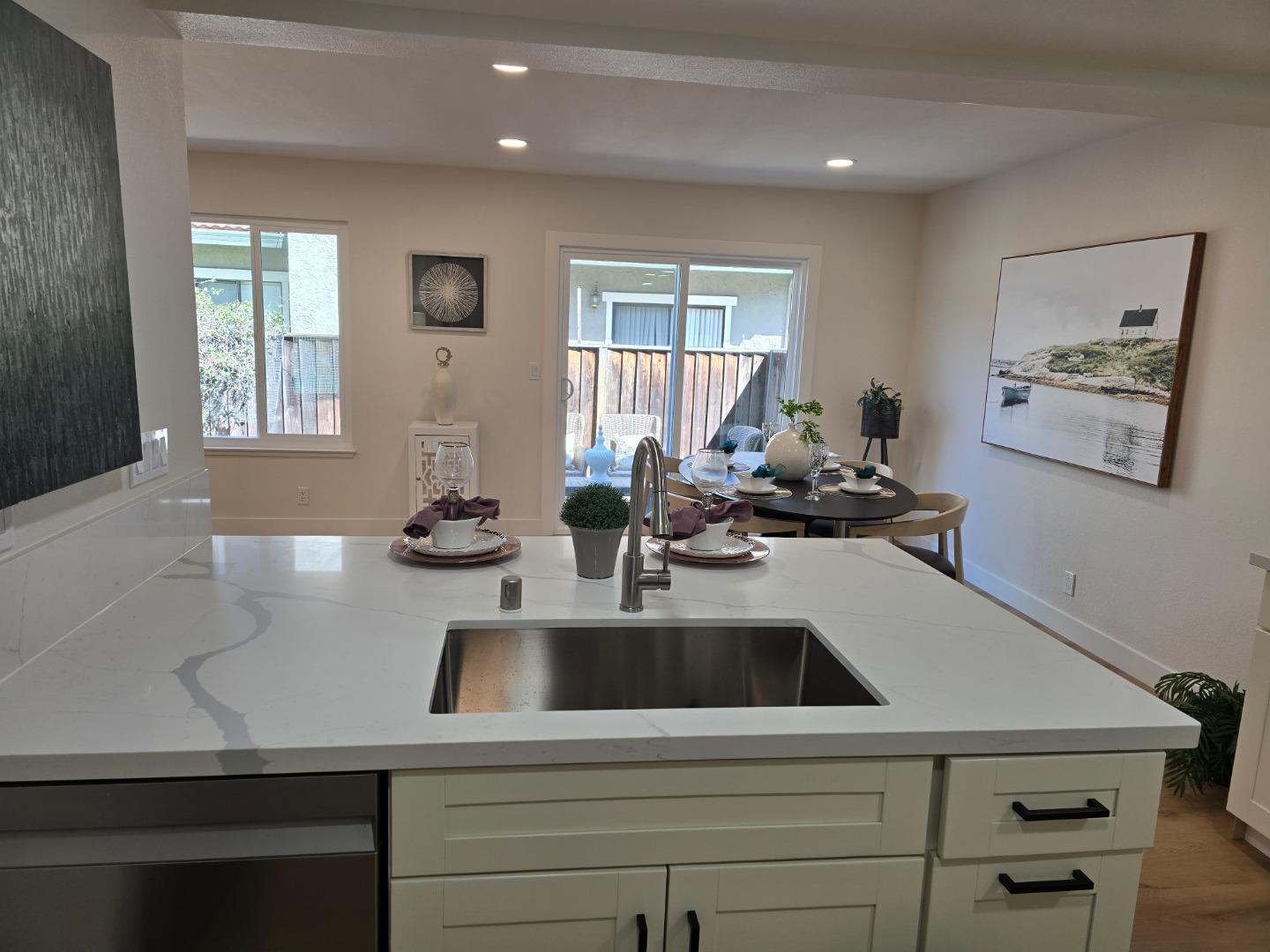 3575 Lehigh Drive, Unit 25 Santa Clara, CA 95051 - Photo 8 of 29 a kitchen with a sink cabinets and window