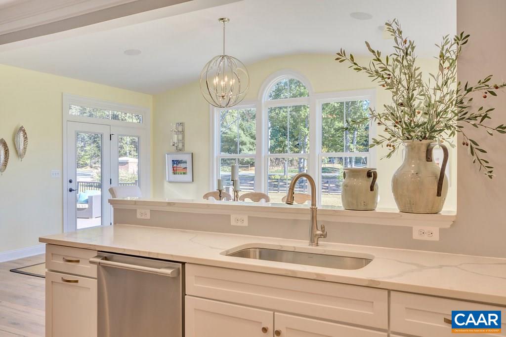 2134 Ridgetop Drive Charlottesville, VA 22903 - Photo 18 of 49 a kitchen with a sink and a large window