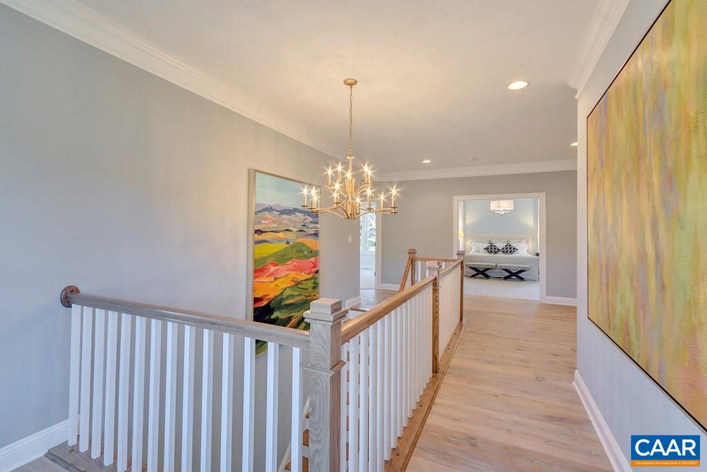 2134 Ridgetop Drive Charlottesville, VA 22903 - Photo 24 of 49 a view of a hallway view with a chandelier