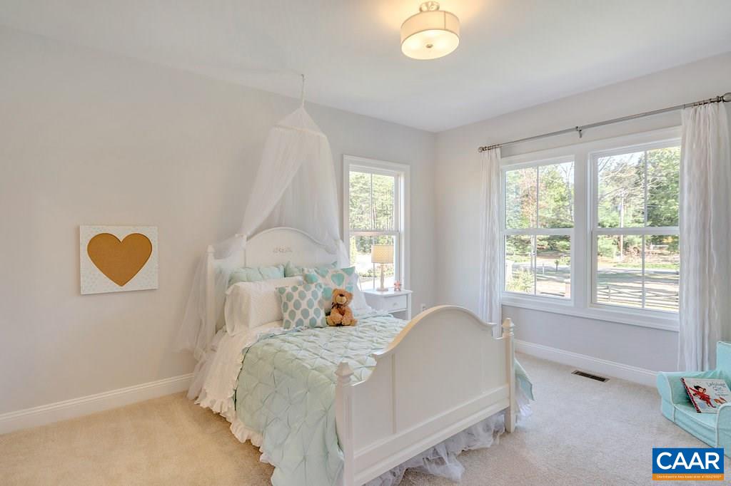 2134 Ridgetop Drive Charlottesville, VA 22903 - Photo 34 of 49 a bed room with a bed and a window