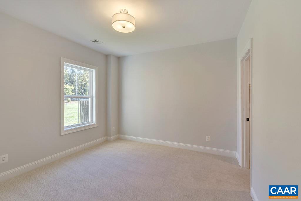 2134 Ridgetop Drive Charlottesville, VA 22903 - Photo 45 of 49 an empty room with windows