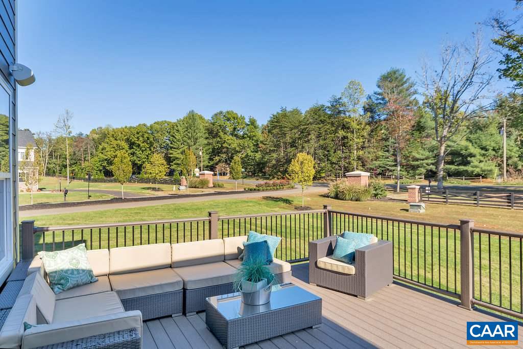 2134 Ridgetop Drive Charlottesville, VA 22903 - Photo 46 of 49 a view of a deck with mountain view and wooden floor