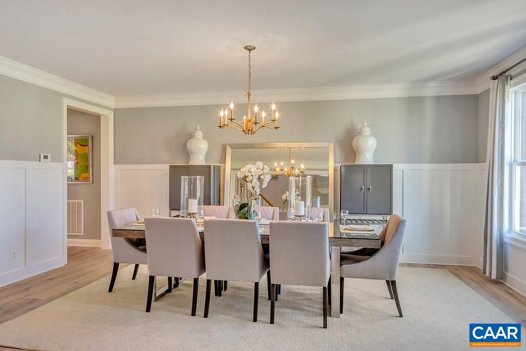 2134 Ridgetop Drive Charlottesville, VA 22903 - Photo 7 of 49 a view of a dining room with furniture window and wooden floor