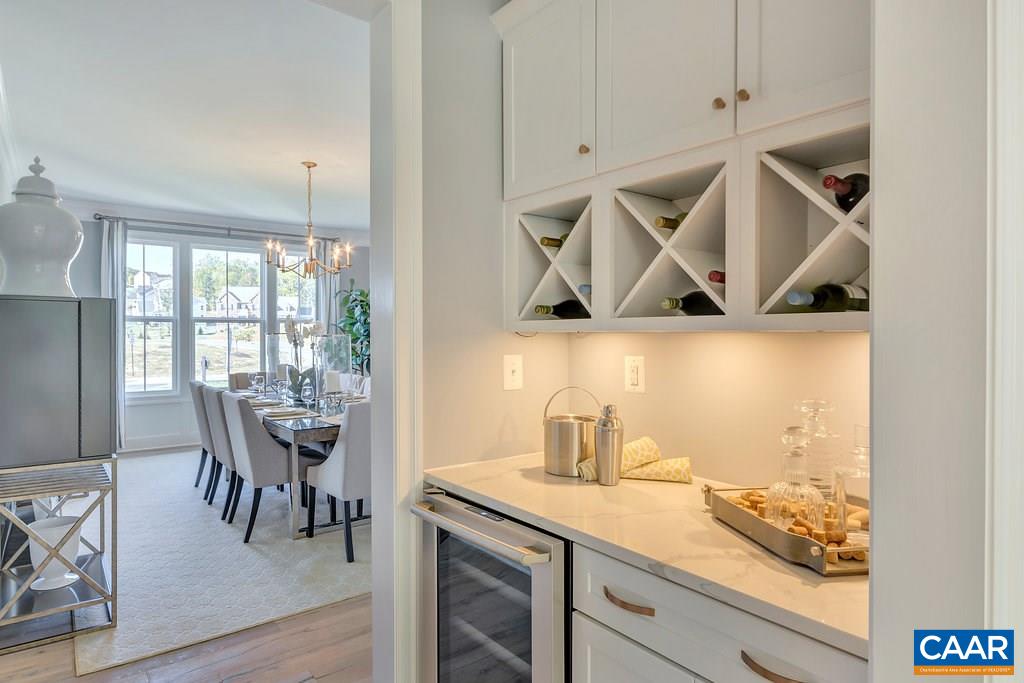 2134 Ridgetop Drive Charlottesville, VA 22903 - Photo 8 of 49 a kitchen with a table and chairs