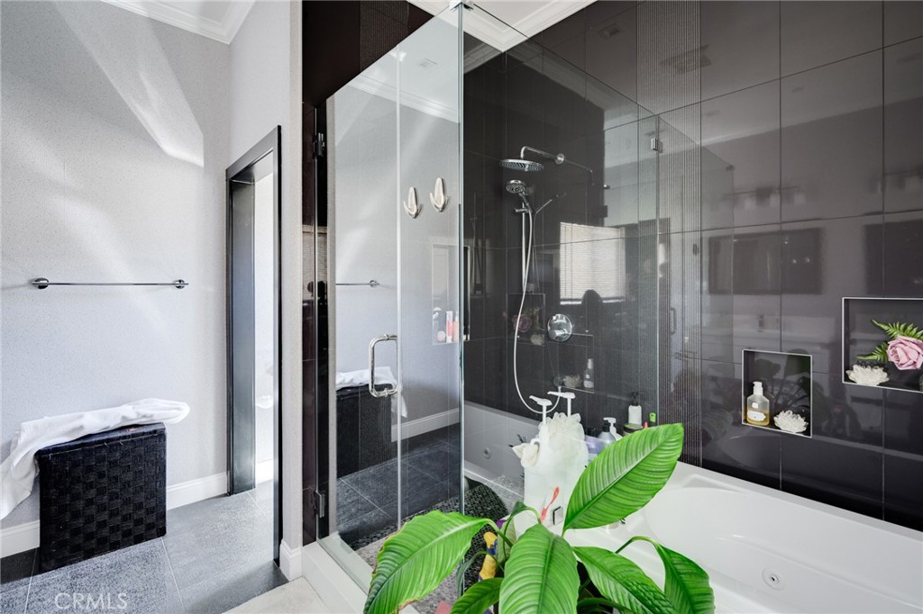 10461 Hillhaven Avenue Tujunga, CA 91042 - Photo 15 of 31 a spacious bathroom with a shower and a sink