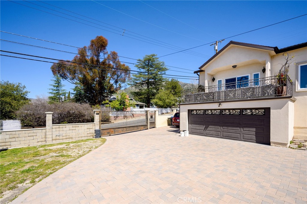 10461 Hillhaven Avenue Tujunga, CA 91042 - Photo 26 of 31 a front view of a house with a yard