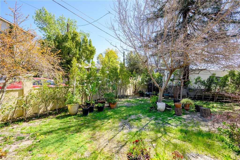 10461 Hillhaven Avenue Tujunga, CA 91042 - Photo 30 of 31 a backyard of a house with lots of green space