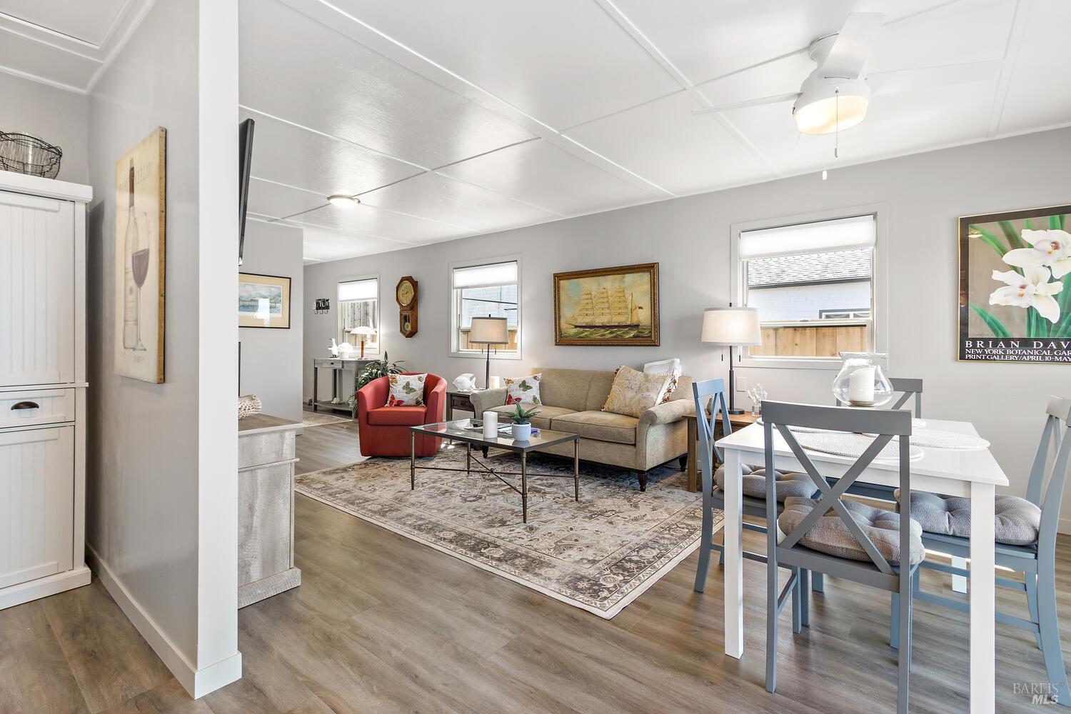 9 Sandy Beach Road Vallejo, CA 94590 - Photo 11 of 25 a living room with furniture wooden floor and a table