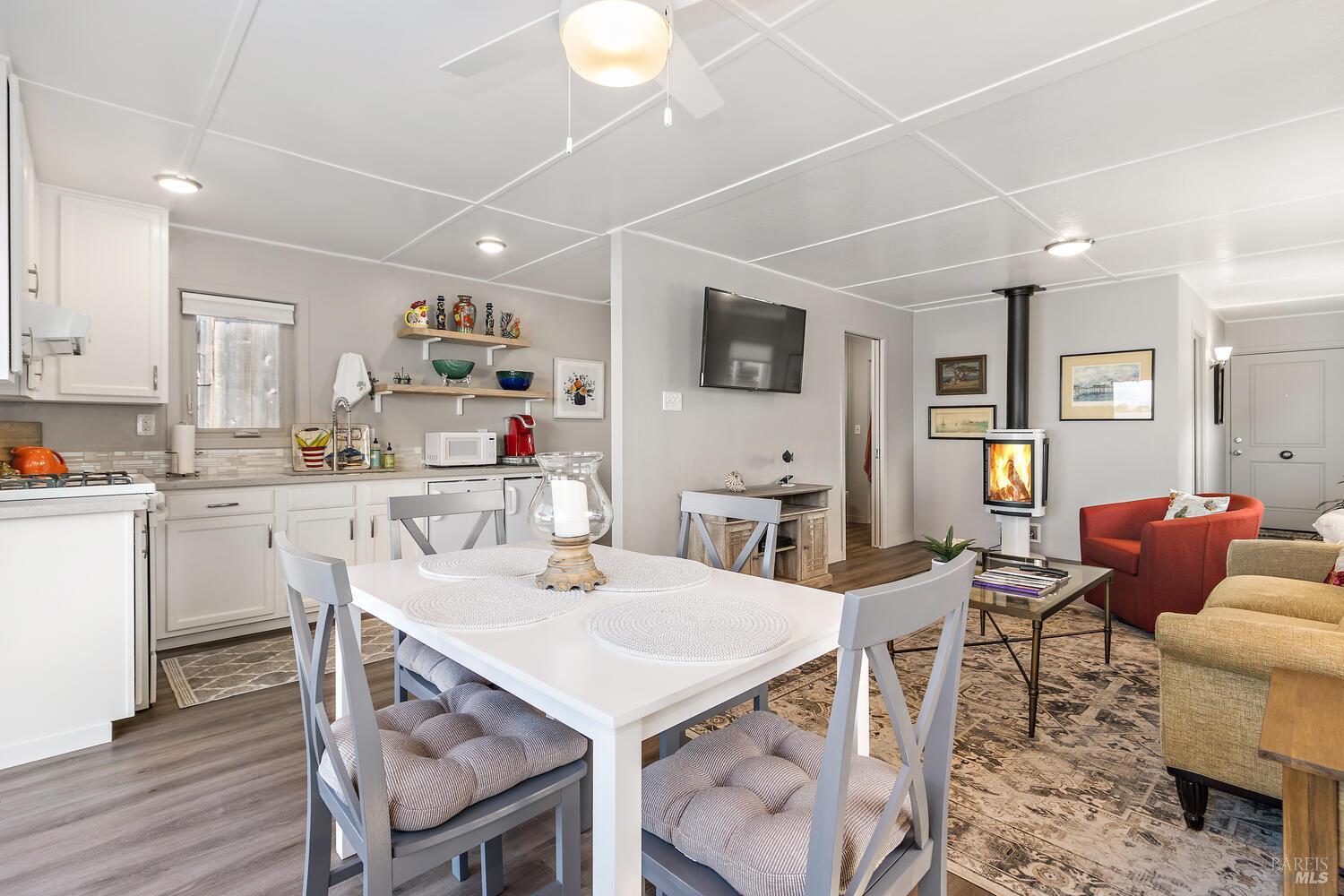 9 Sandy Beach Road Vallejo, CA 94590 - Photo 12 of 25 a view of kitchen with cabinets table and chairs