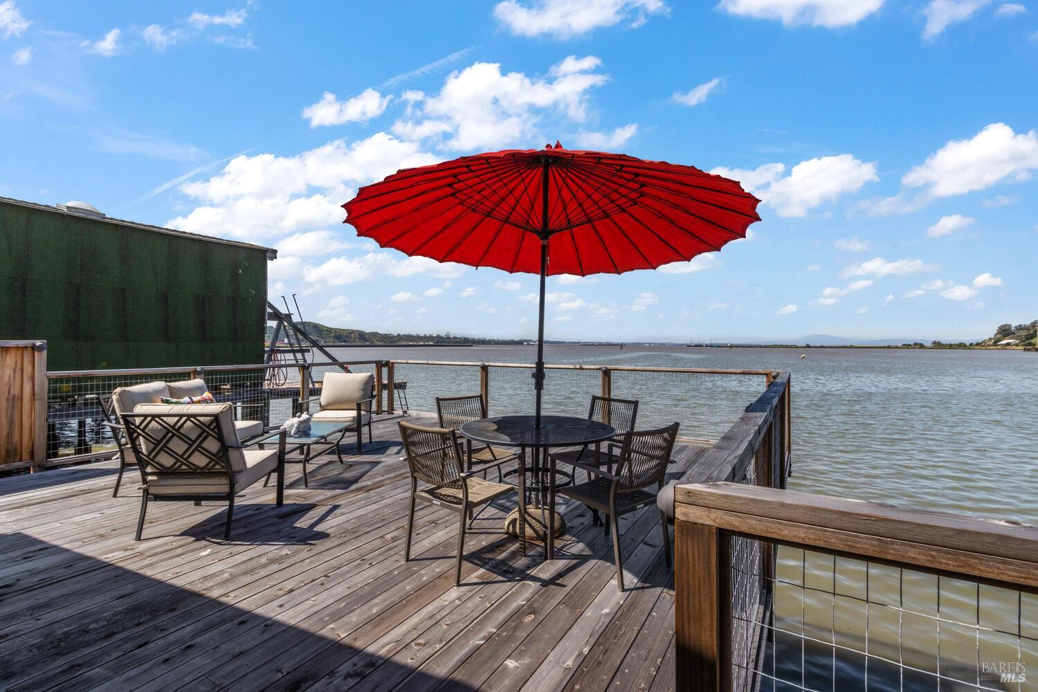 9 Sandy Beach Road Vallejo, CA 94590 - Photo 18 of 25 an outdoor space with furniture and umbrella