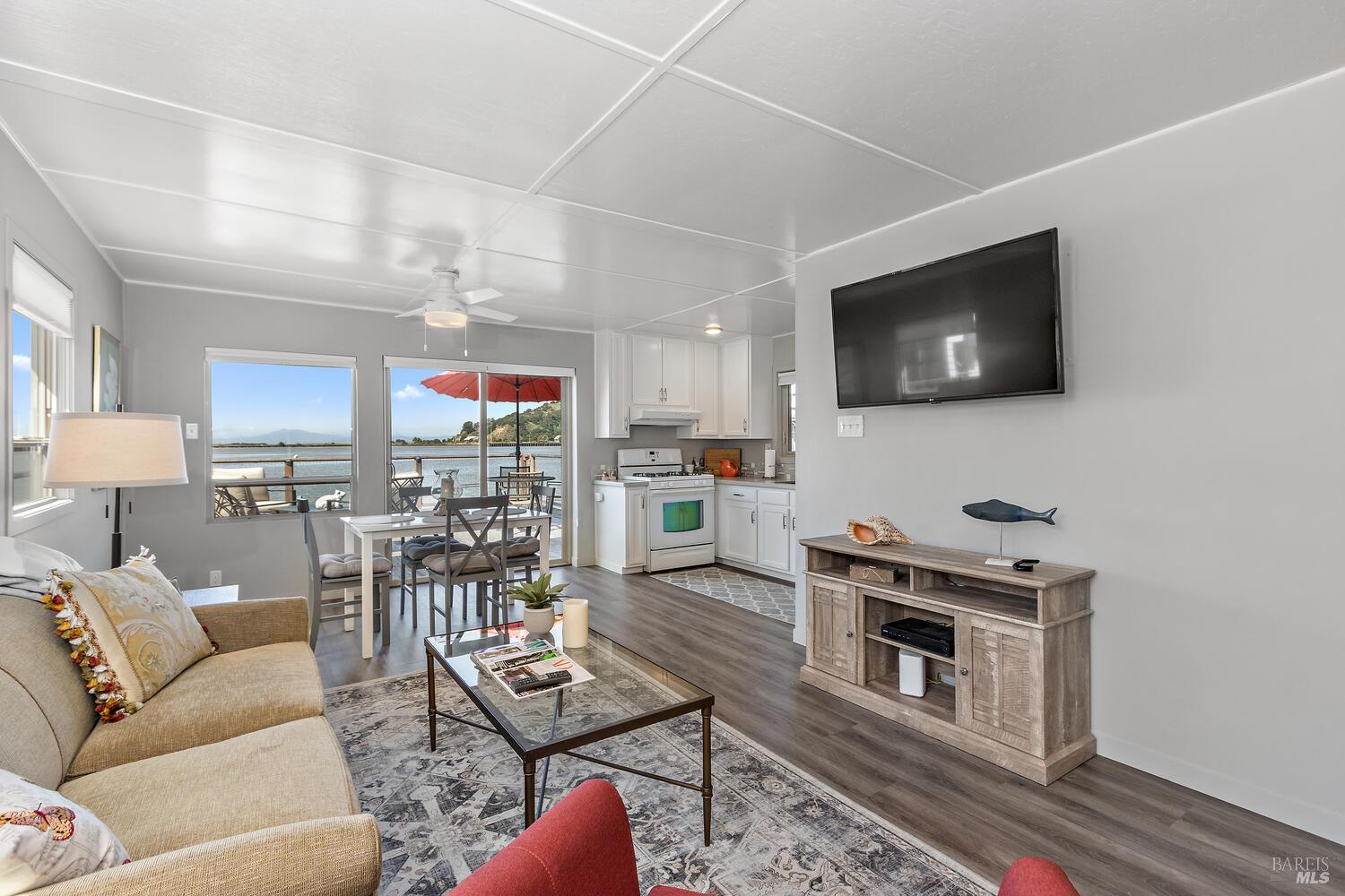 9 Sandy Beach Road Vallejo, CA 94590 - Photo 5 of 25 a living room with furniture and a flat screen tv