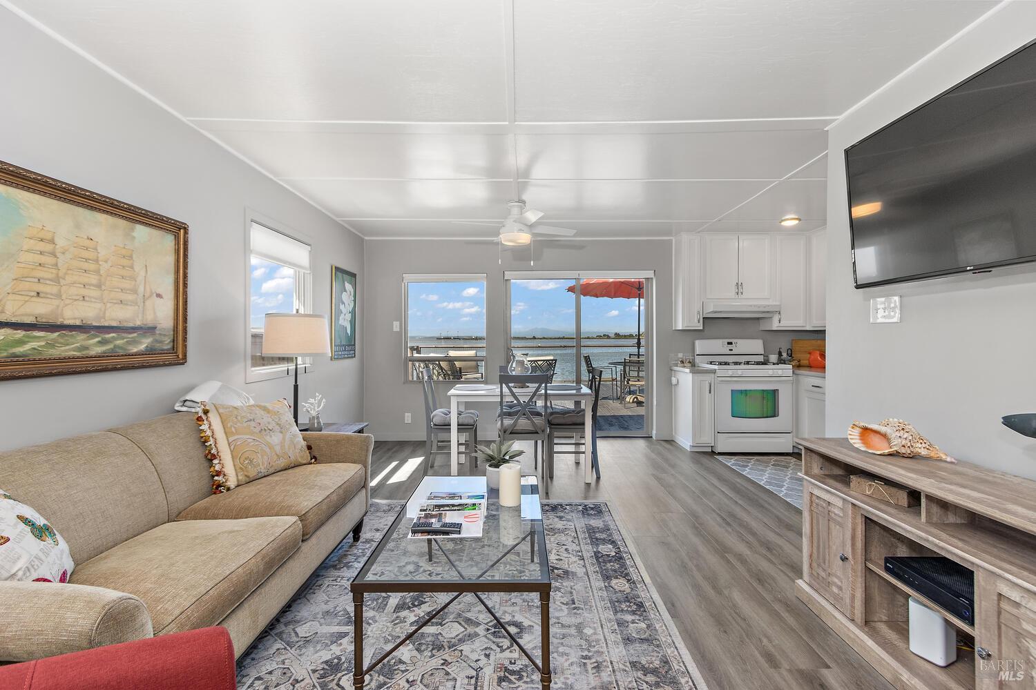 9 Sandy Beach Road Vallejo, CA 94590 - Photo 7 of 25 a living room with furniture and a flat screen tv