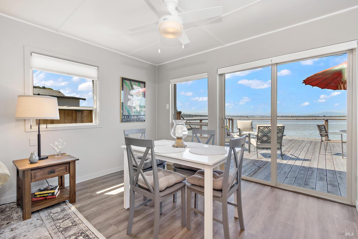 9 Sandy Beach Road Vallejo, CA 94590 - Photo 8 of 25 a view of a dining room with furniture and wooden floor