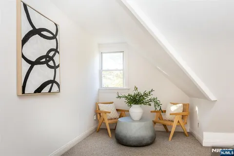 a view of a room with table and chair