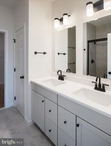 a view of front door with wooden floor