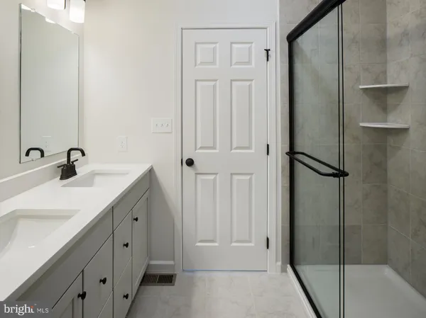 a room with white wall paint and white walls