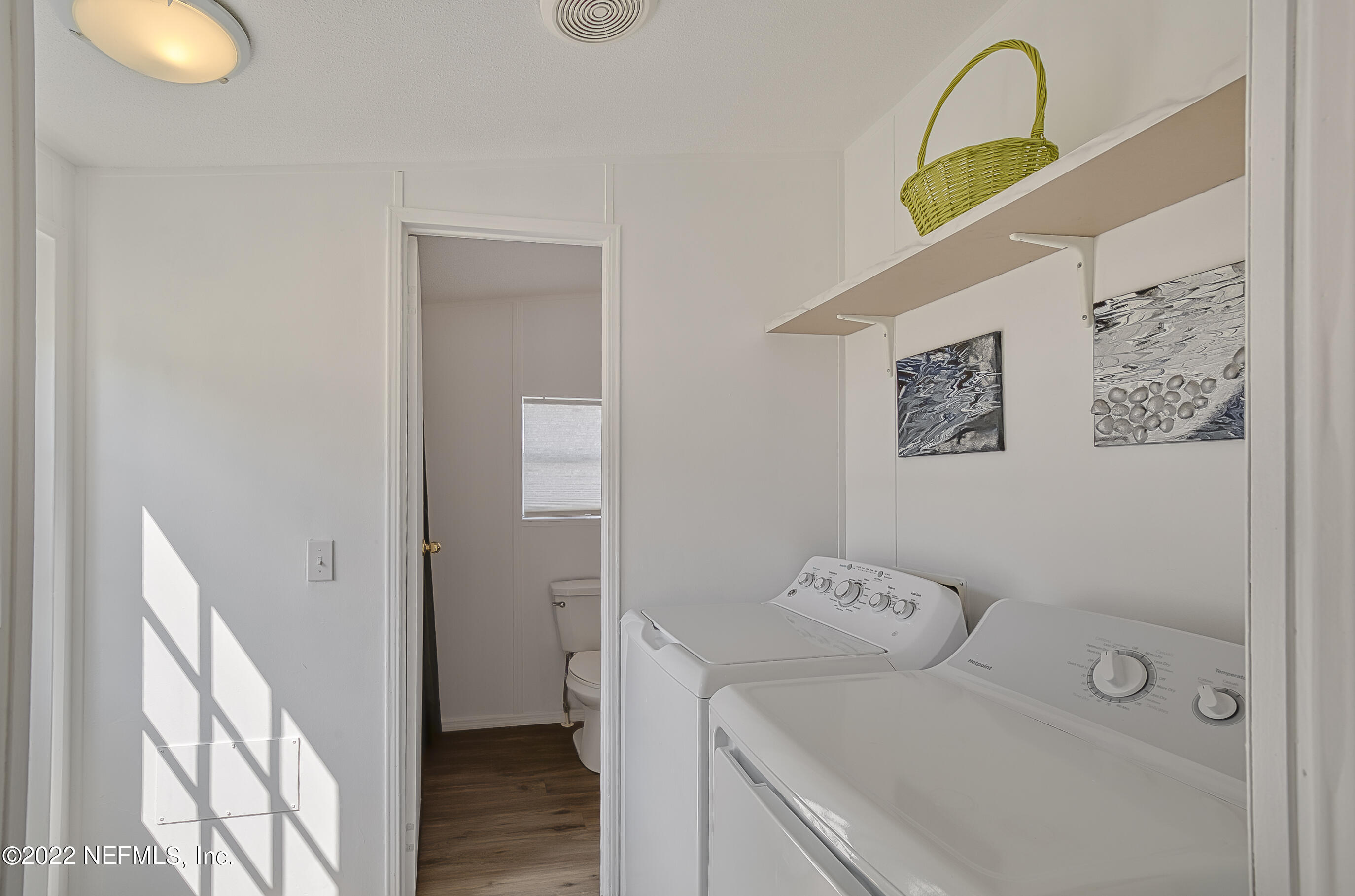 4509 De Leon Place St. Augustine, FL 32095 - Photo 11 of 35 a bathroom with a sink and vanity