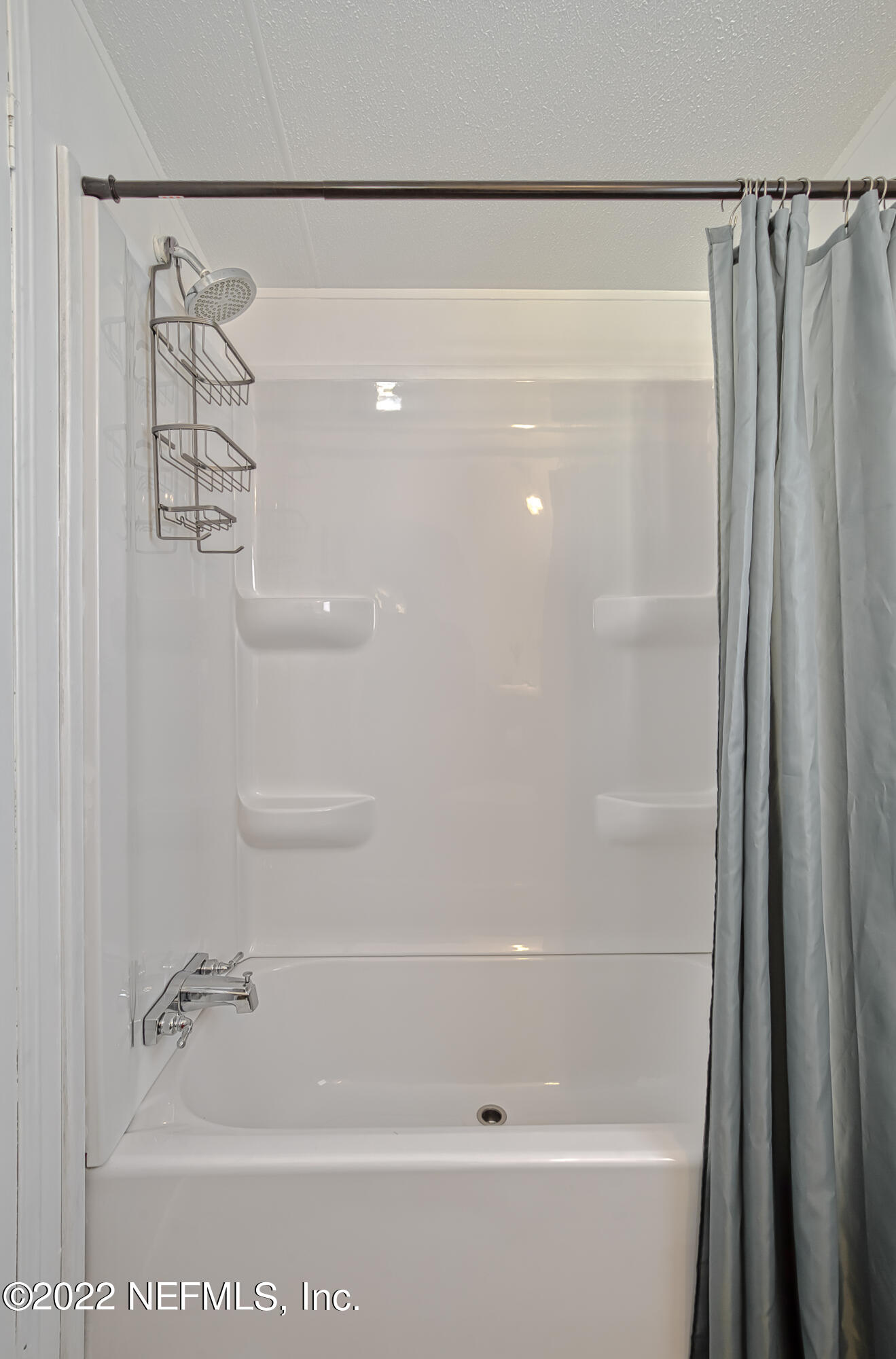 4509 De Leon Place St. Augustine, FL 32095 - Photo 21 of 35 a bathroom with a shower and a bath tub