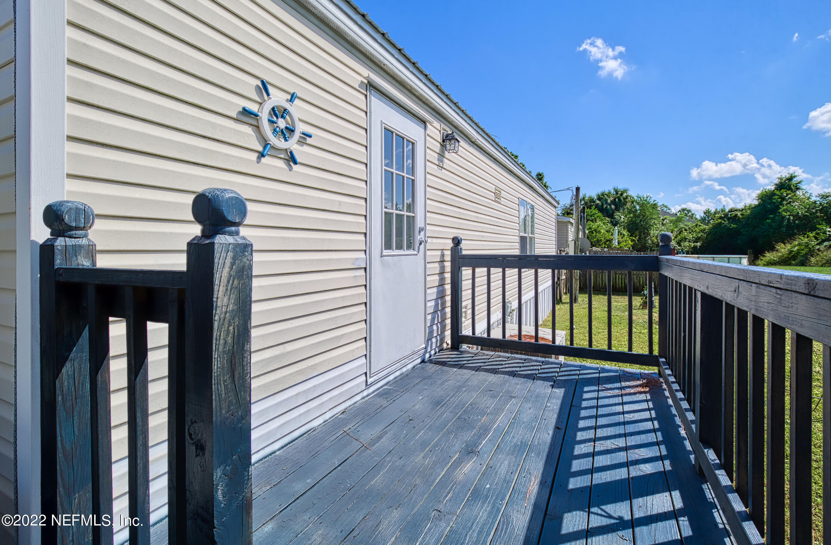 4509 De Leon Place St. Augustine, FL 32095 - Photo 25 of 35 a view of a balcony with wooden floor