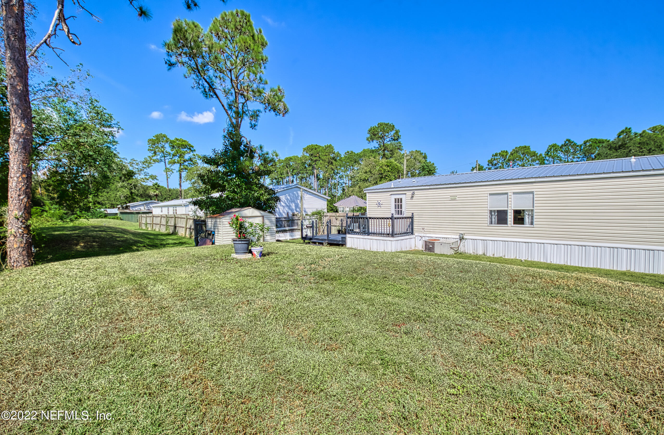 4509 De Leon Place St. Augustine, FL 32095 - Photo 27 of 35 a front view of a house with a garden