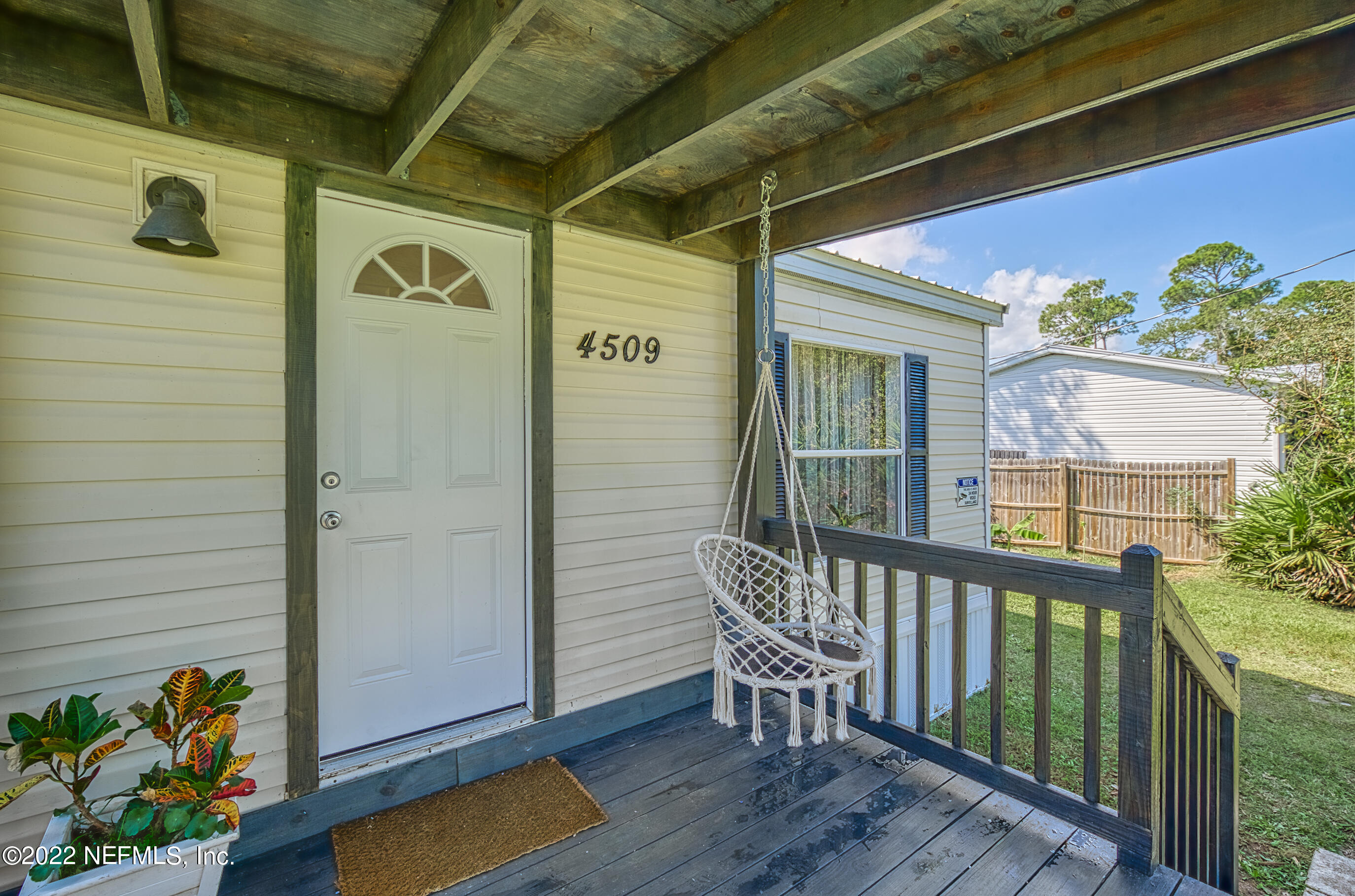 4509 De Leon Place St. Augustine, FL 32095 - Photo 30 of 35 a view of a porch with furniture