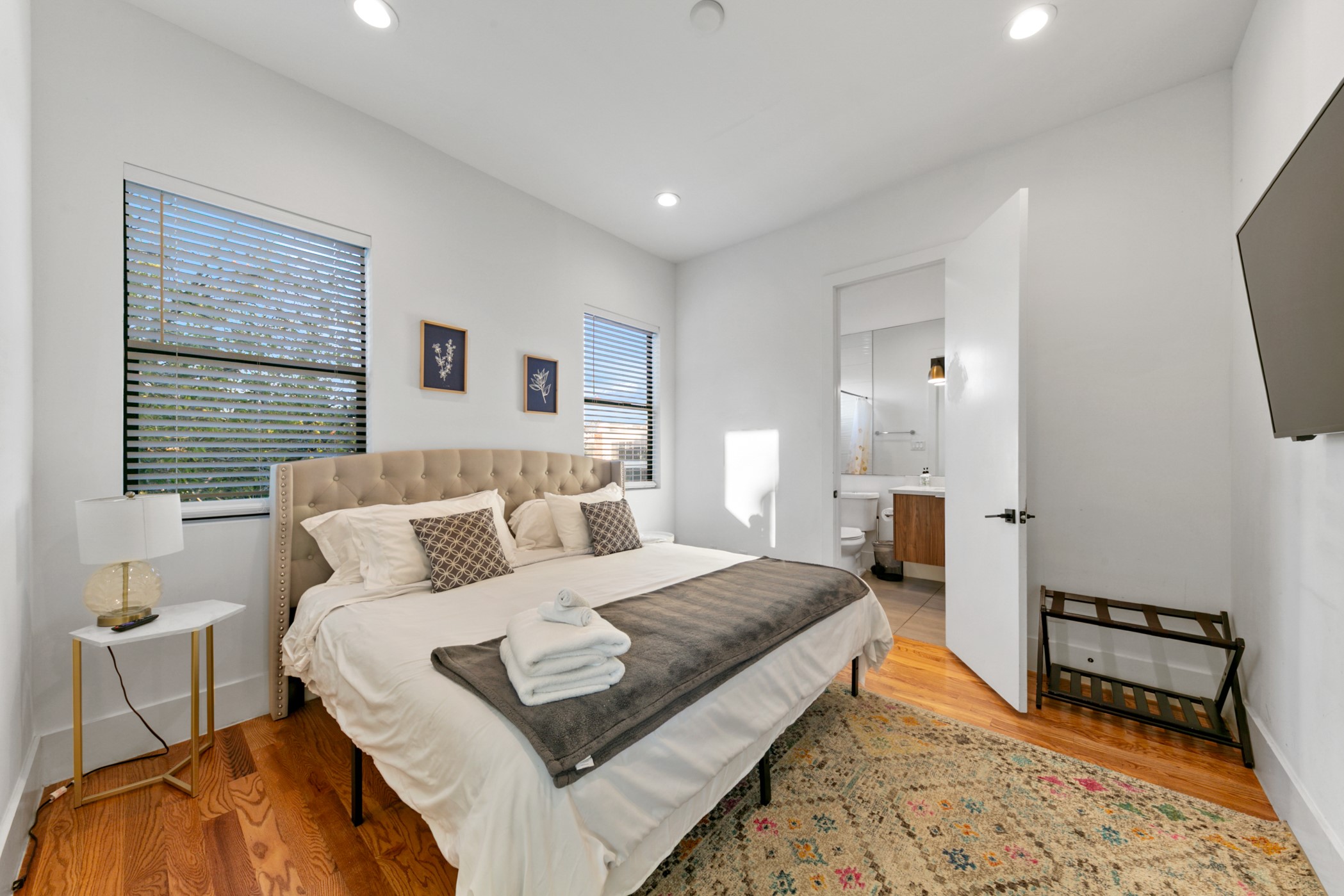 608 Oakley Street Houston, TX 77006 - Photo 17 of 37 a bedroom with a bed and a couch