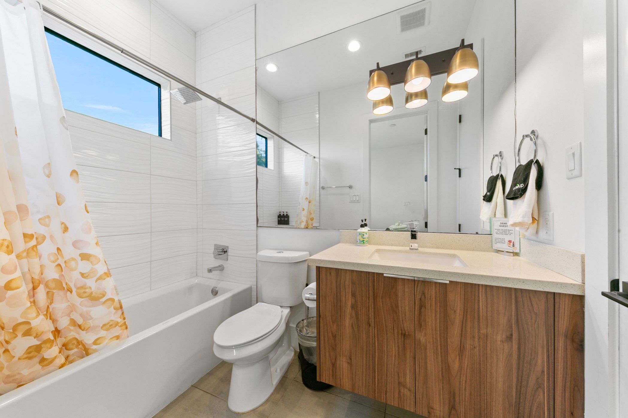 608 Oakley Street Houston, TX 77006 - Photo 19 of 37 a bathroom with a sink a toilet and shower