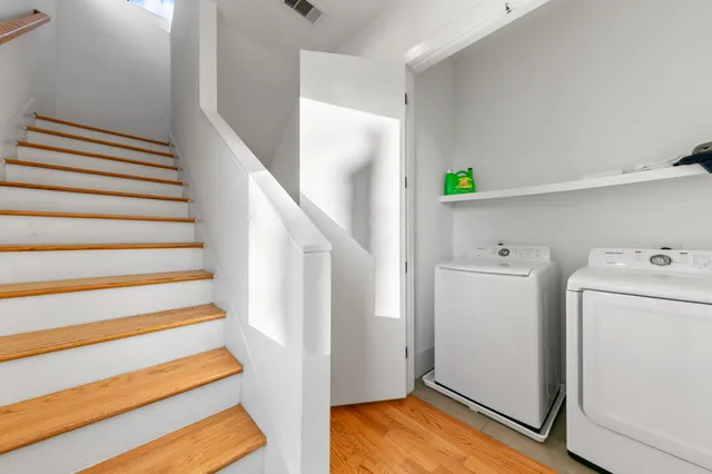 a view of entryway with washer and dryer