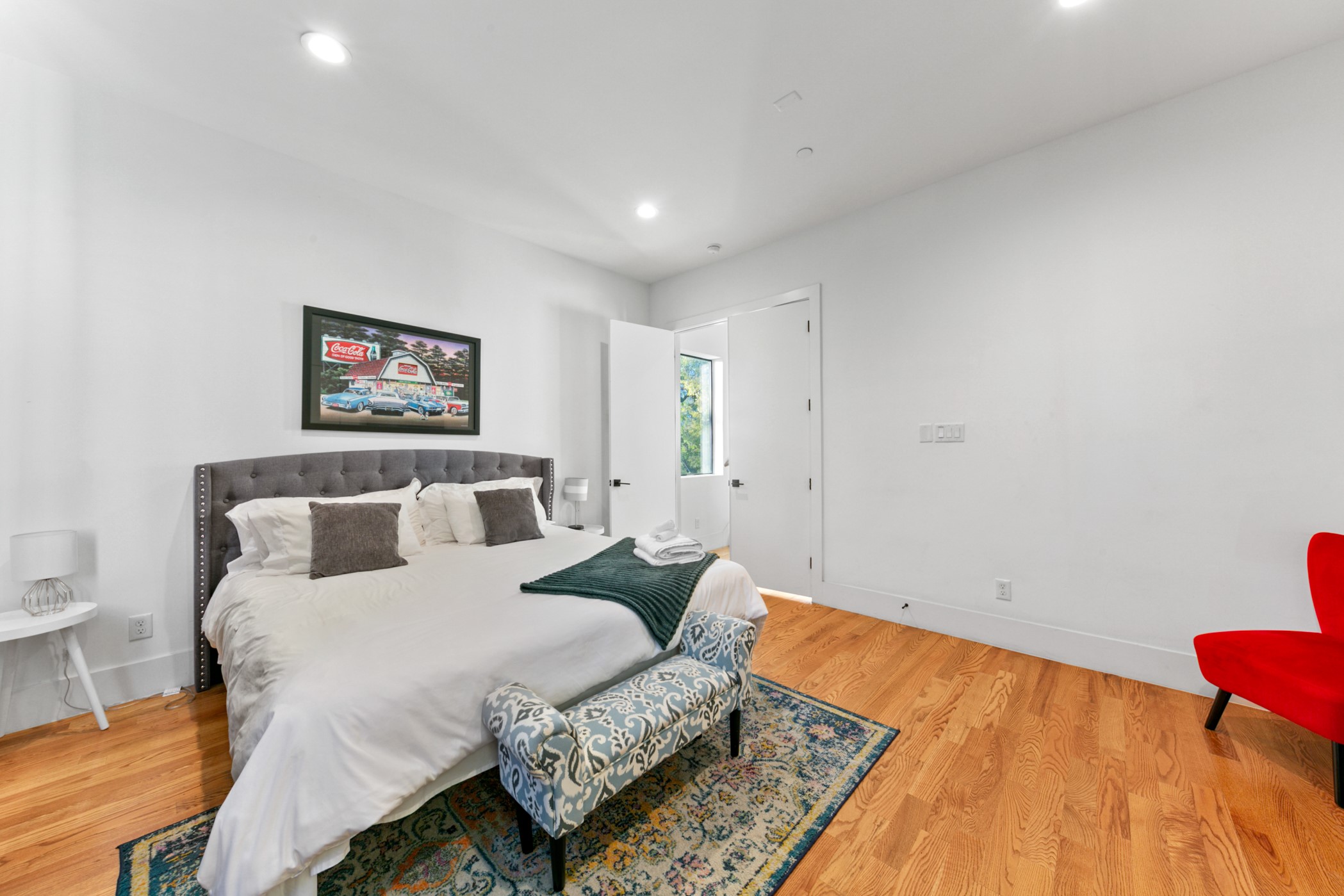 608 Oakley Street Houston, TX 77006 - Photo 22 of 37 a bed room with a bed and a couch