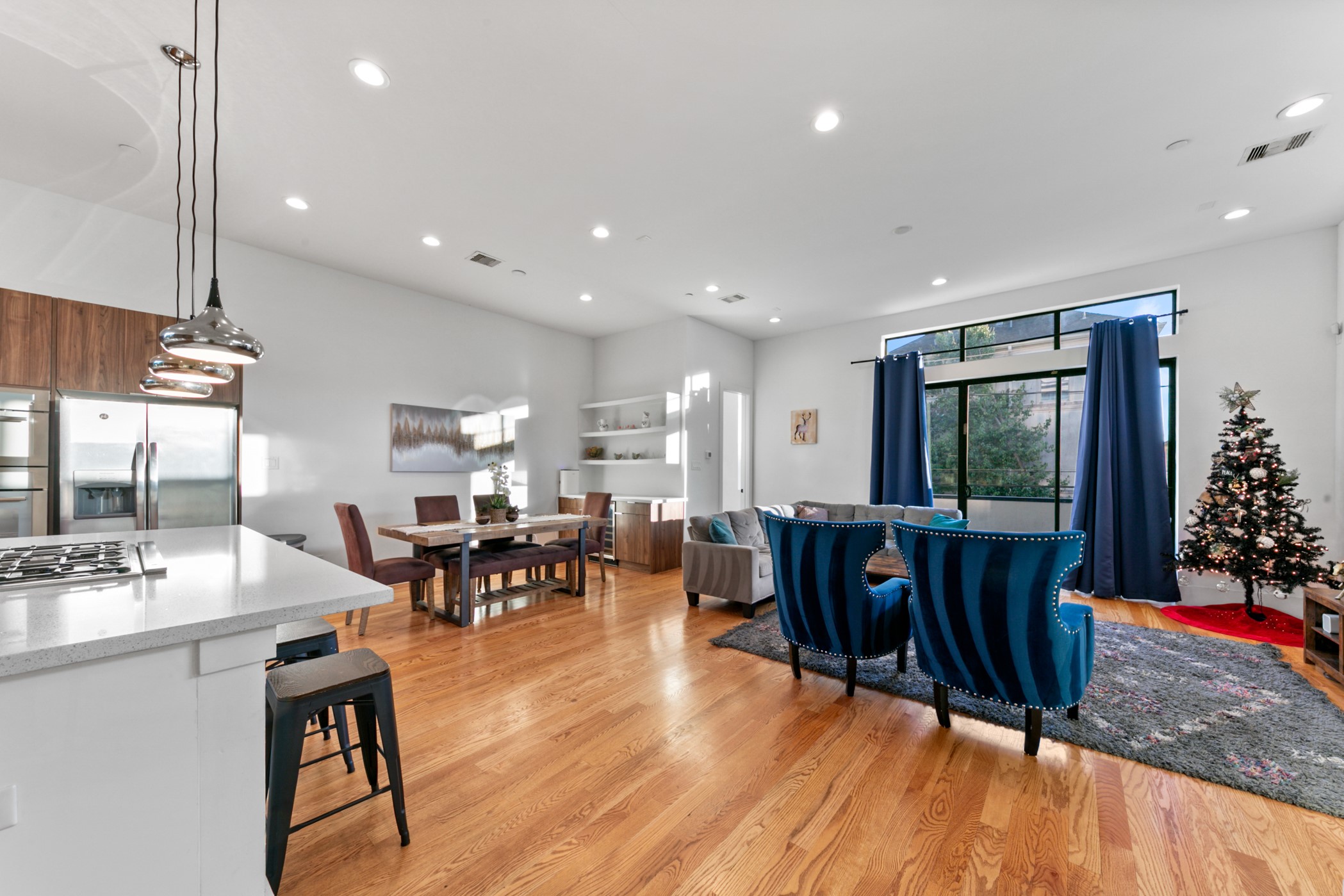 608 Oakley Street Houston, TX 77006 - Photo 7 of 37 a view of a dining room with furniture window and wooden floor
