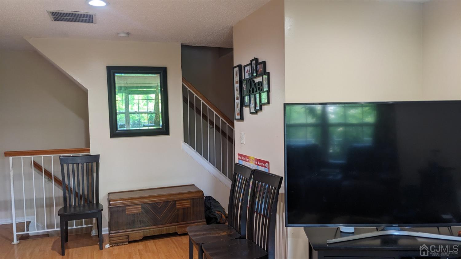 7 Newburgh Drive Edison, NJ 08820 - Photo 6 of 20 a view of entryway and hall with wooden floor