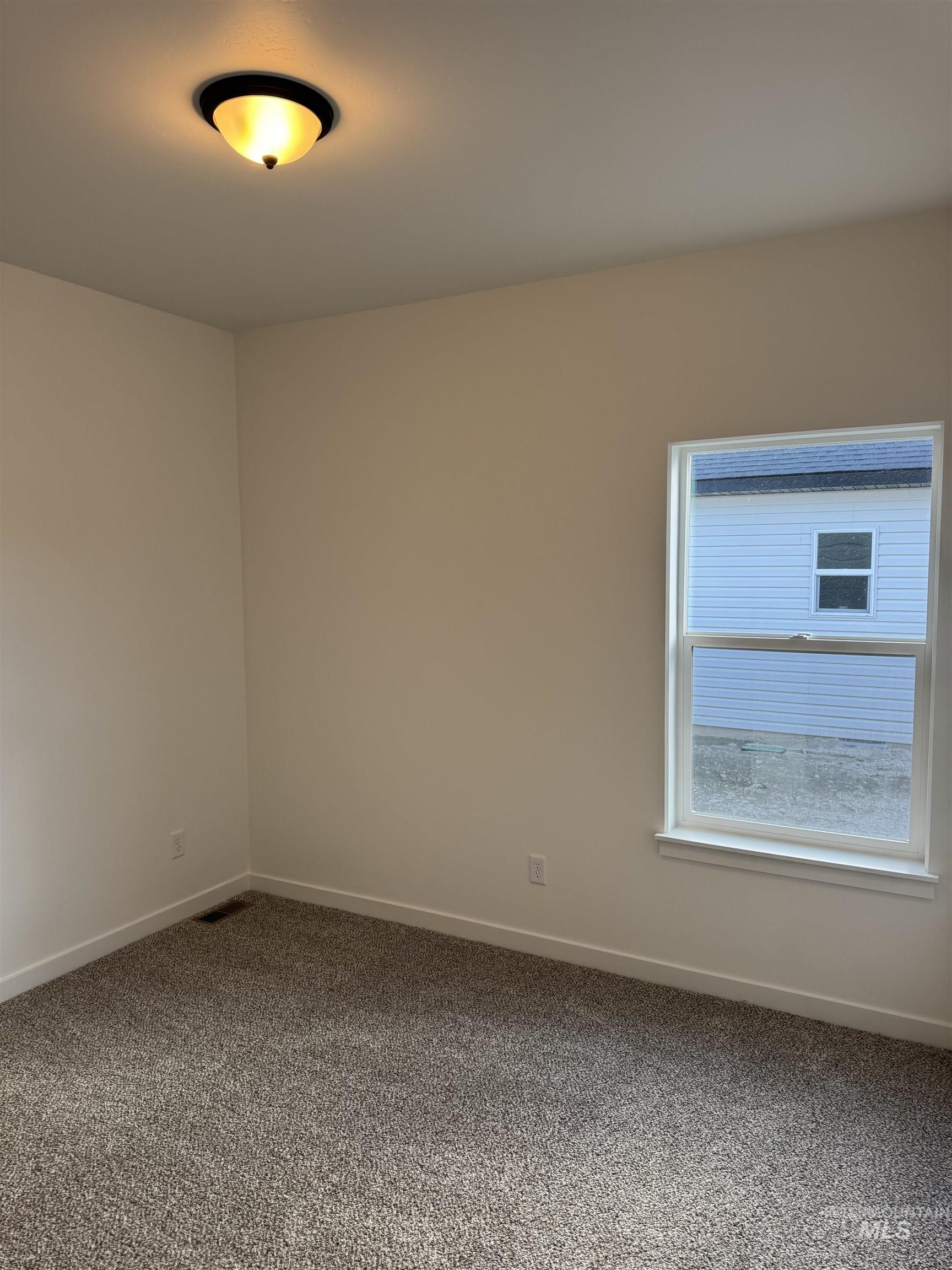 2008 Harrison Street South Twin Falls, ID 83301 - Photo 22 of 32 Empty room with baseboards and carpet floors