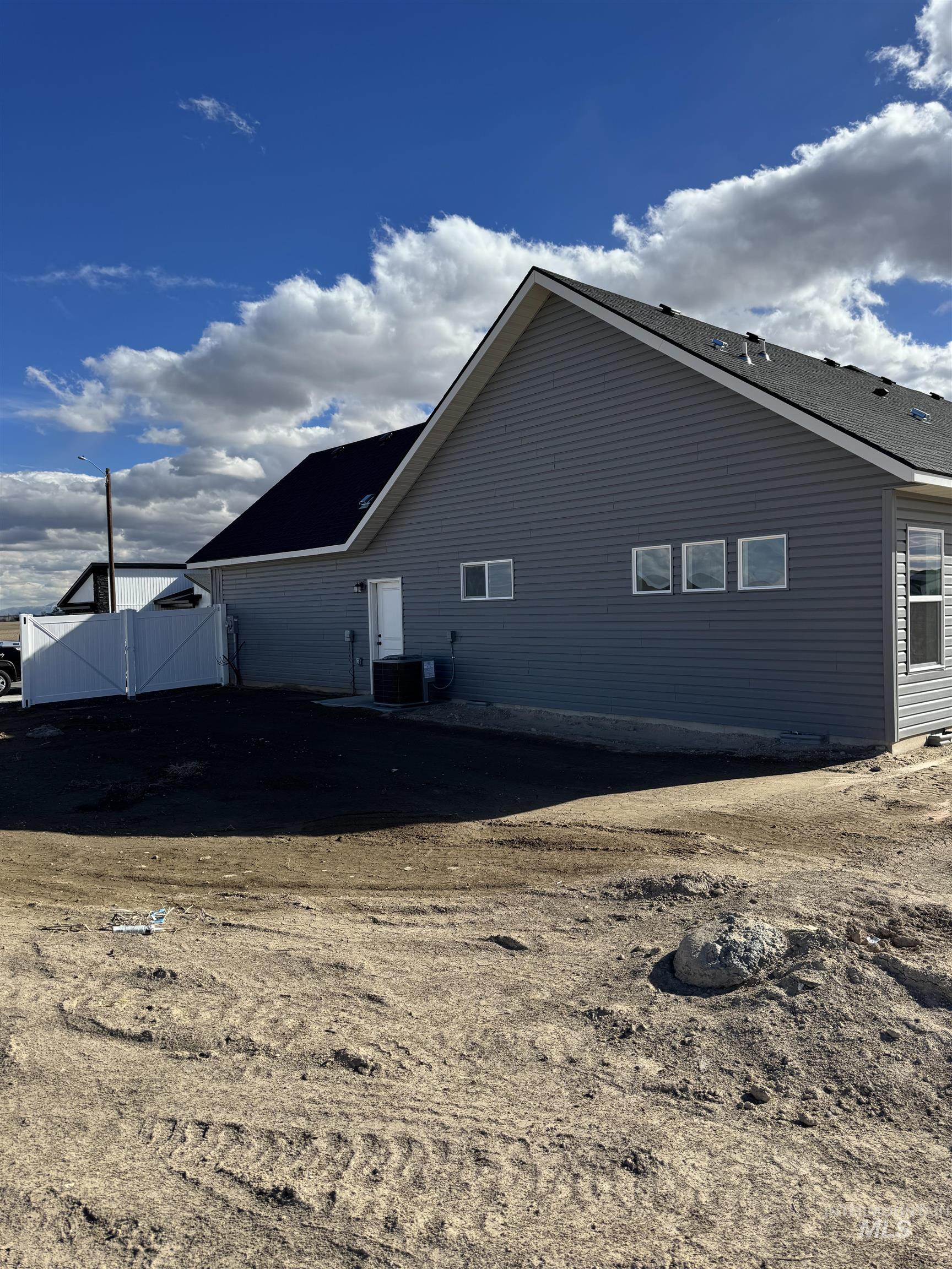 2008 Harrison Street South Twin Falls, ID 83301 - Photo 28 of 32 View of side of home with a cooling unit