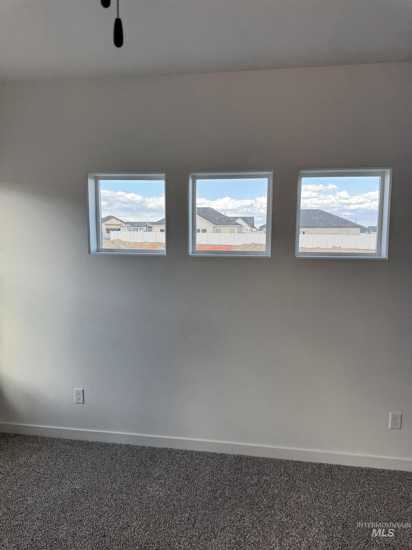 2008 Harrison Street South Twin Falls, ID 83301 - Photo 10 of 32 Unfurnished room featuring baseboards and carpet floors
