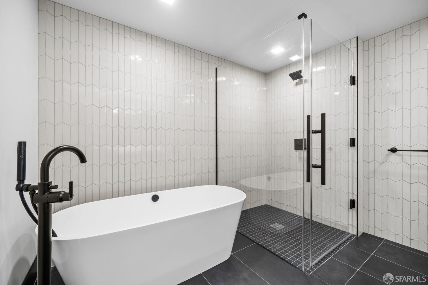 950 Tennessee Street, Unit 404 San Francisco, CA 94107 - Photo 25 of 80 a bathroom with a bathtub and a shower