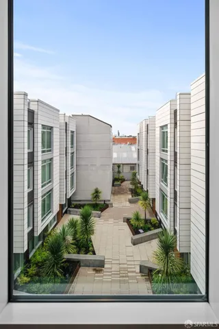 a view of city with tall buildings