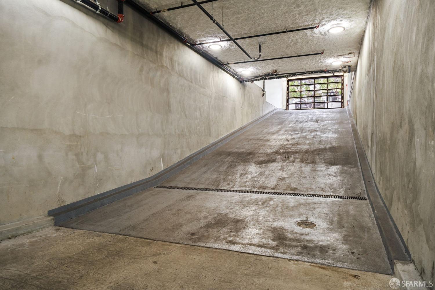 950 Tennessee Street, Unit 404 San Francisco, CA 94107 - Photo 58 of 80 a view of a big room with wooden floor and windows