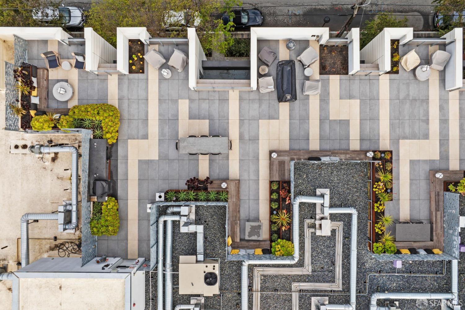 950 Tennessee Street, Unit 404 San Francisco, CA 94107 - Photo 77 of 80 a aerial view of multi story residential apartment building with yard