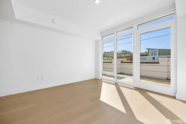 a view of a lake with a house in the background