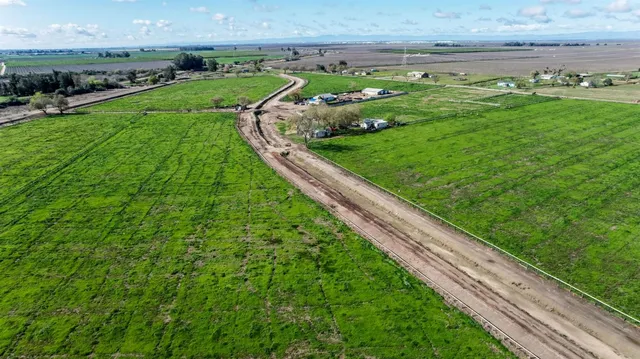 a view of a garden with an outdoor space