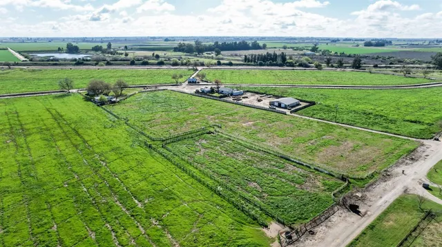 an aerial view of a golf course with a park