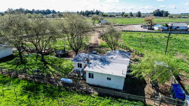 an aerial view of a yard with outdoor space