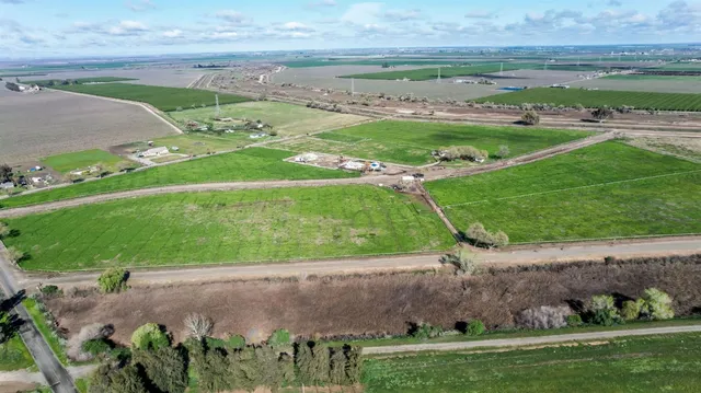 an aerial view of a golf course with a park