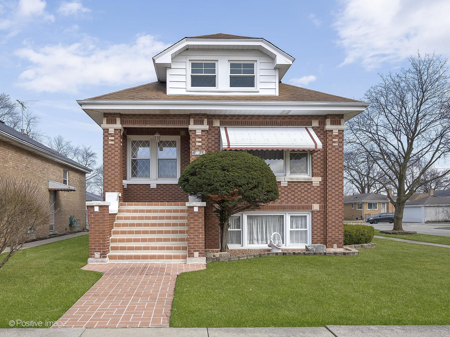 2435 Keystone Avenue North Riverside, IL 60546 - Photo 1 of 27 a front view of a house with a yard