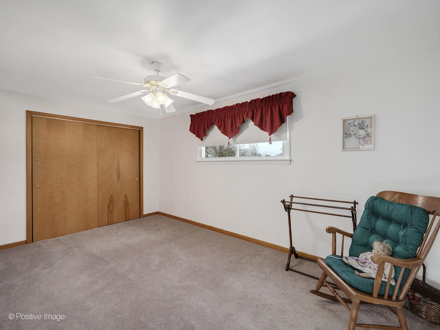 2435 Keystone Avenue North Riverside, IL 60546 - Photo 14 of 27 a view of a workspace with furniture and a ceiling fan
