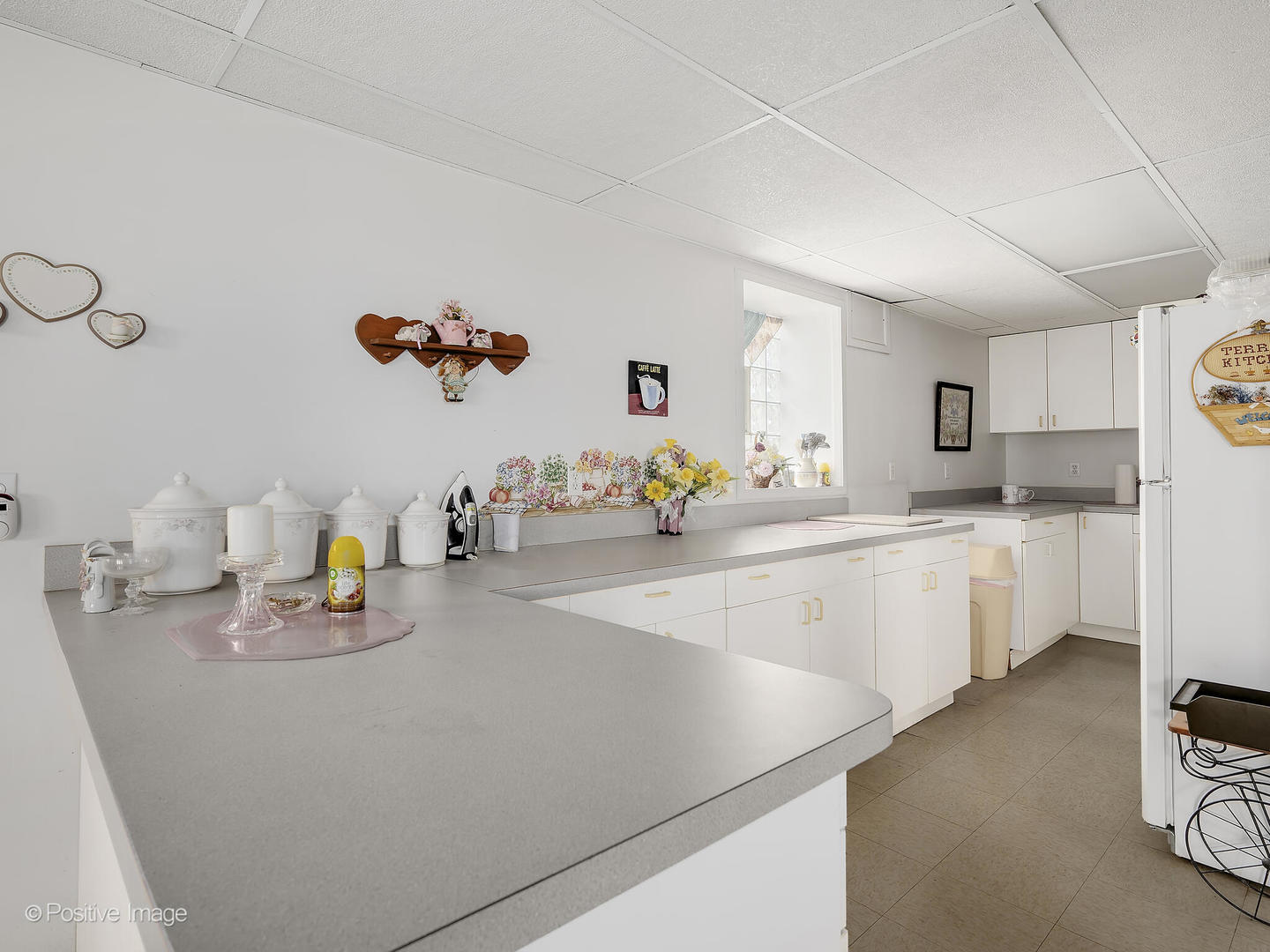 2435 Keystone Avenue North Riverside, IL 60546 - Photo 17 of 27 a kitchen with a sink refrigerator and cabinets