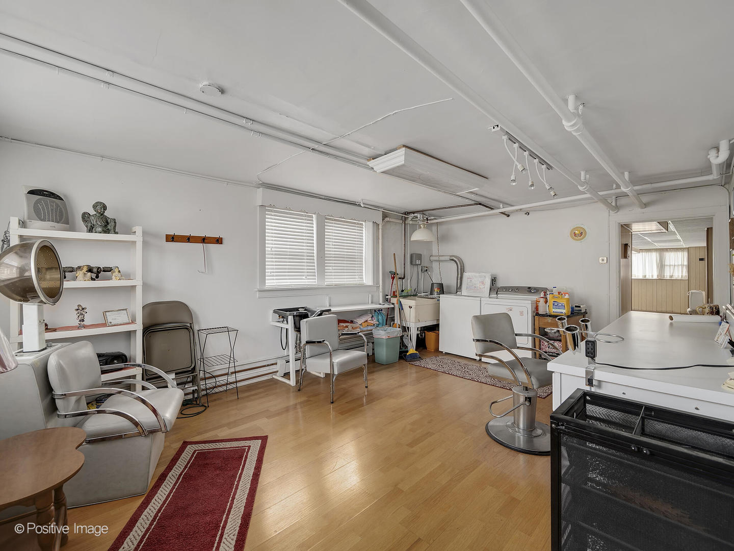 2435 Keystone Avenue North Riverside, IL 60546 - Photo 23 of 27 a room with furniture a rug and a window