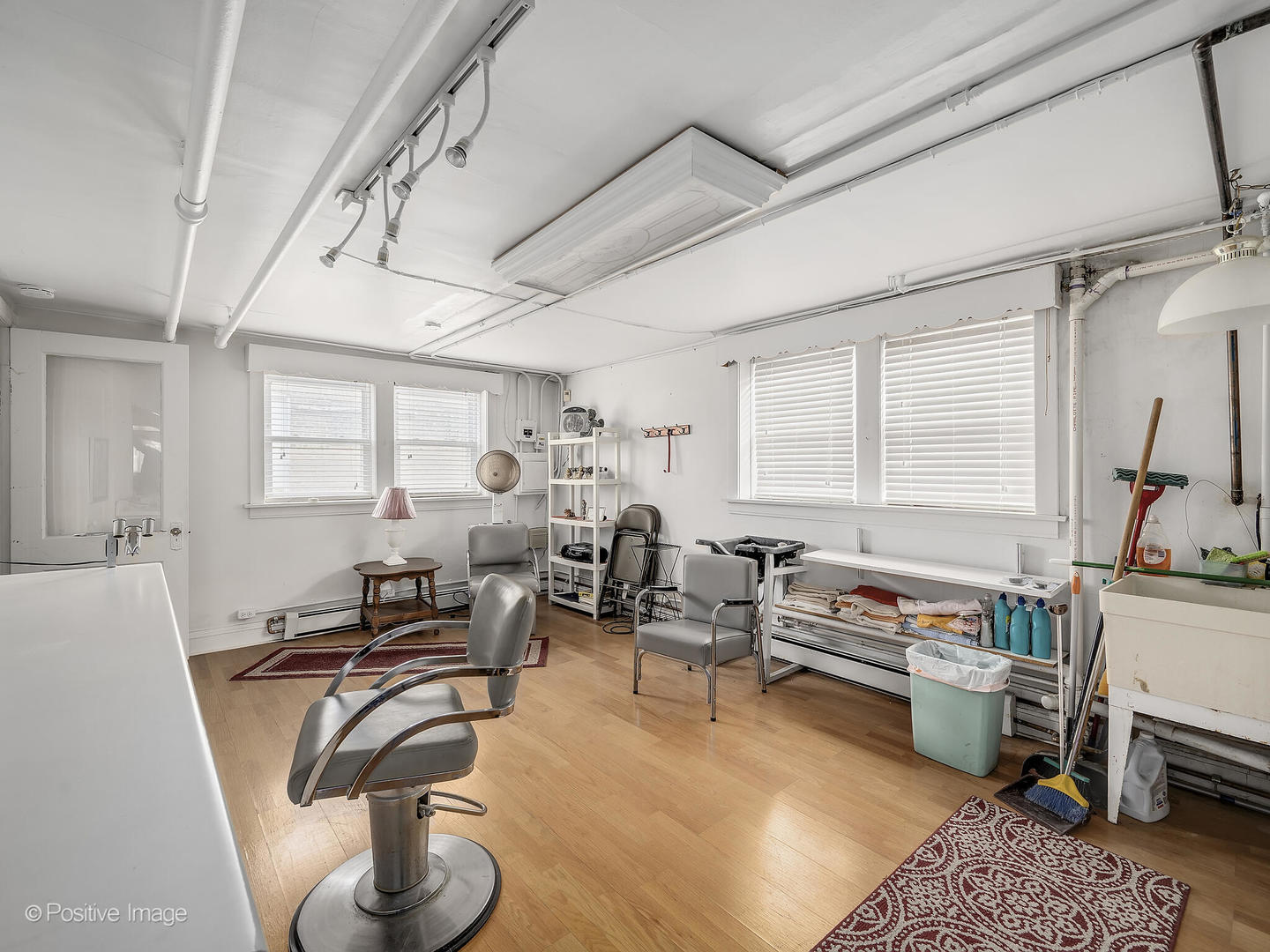 2435 Keystone Avenue North Riverside, IL 60546 - Photo 24 of 27 a living room with furniture gym equipment and a window