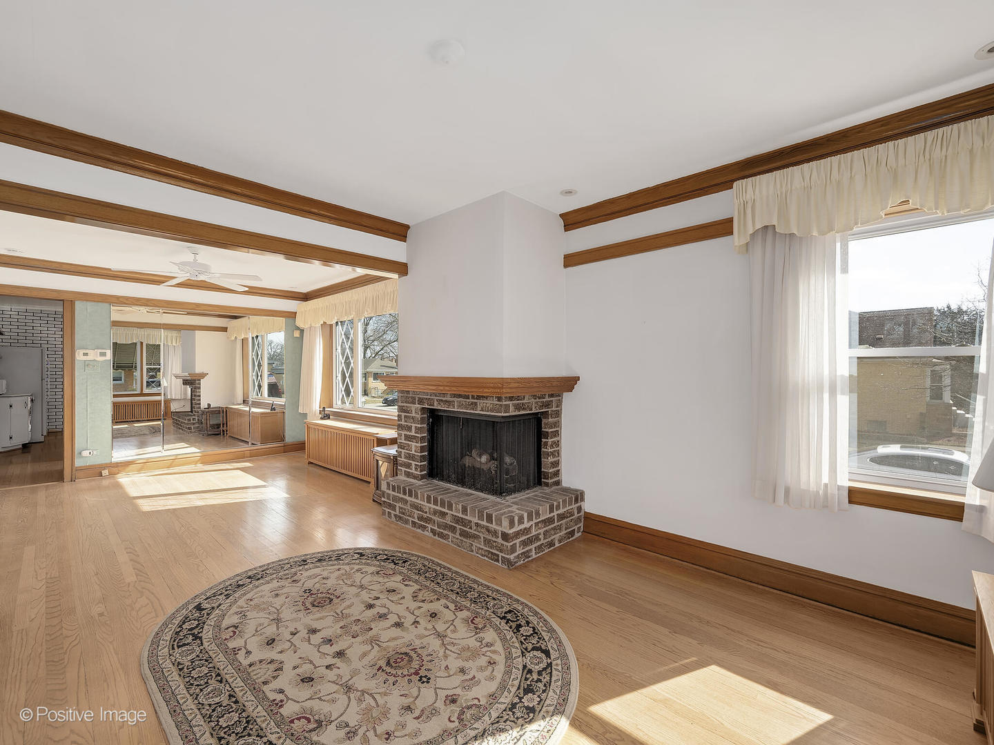 2435 Keystone Avenue North Riverside, IL 60546 - Photo 7 of 27 a living room with furniture and a fireplace