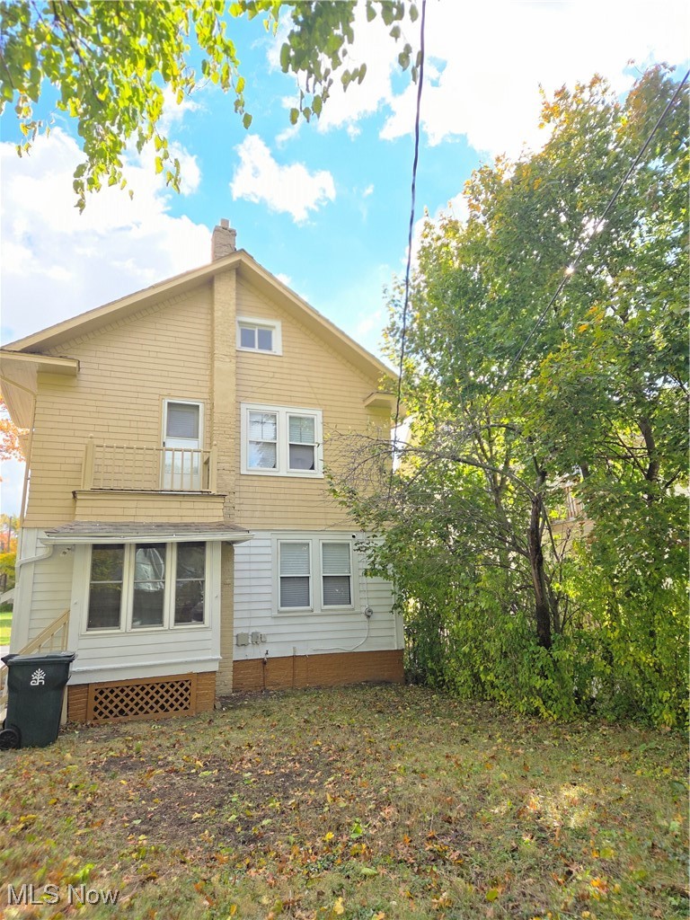 3797 Delmore Road Cleveland, OH 44121 - Photo 39 of 39 Back of property with a chimney and a balcony